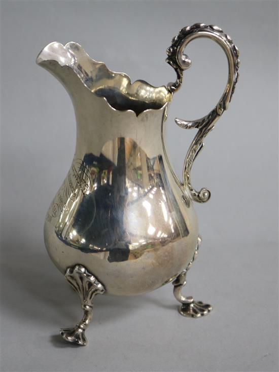 A Victorian silver baluster cream jug, Charles Fox II, London, 1839, 5.9 oz.